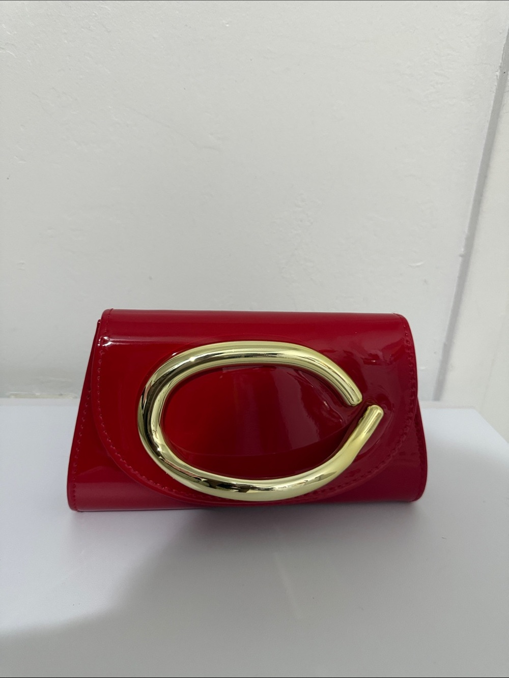 Glossy Red Patent Clutch with Bold Gold Accent